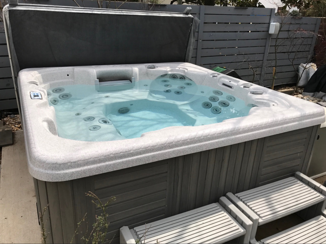 Outdoor hot tub with dedicated GFCI-protected circuit